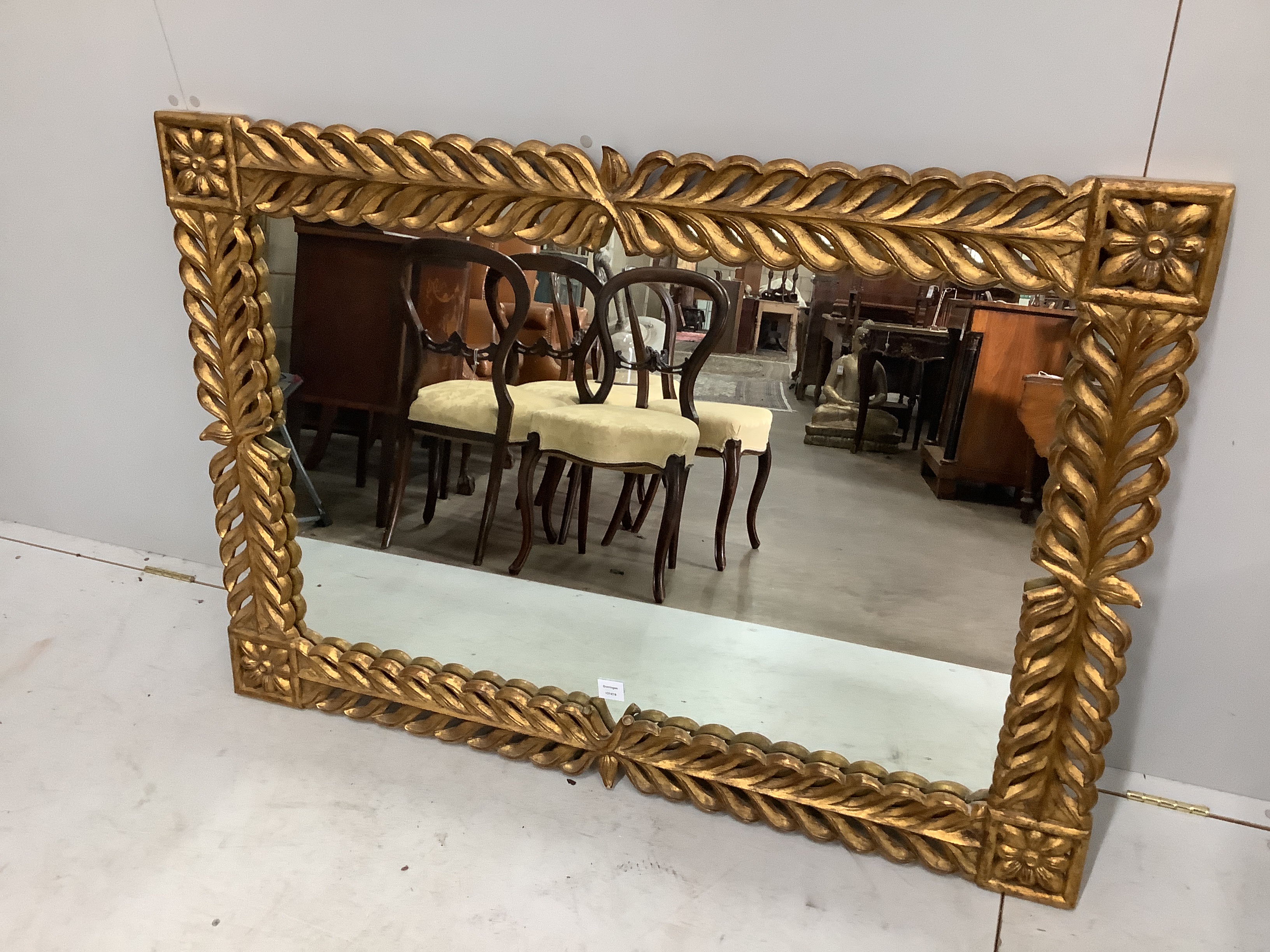 A Regency style rectangular gilt composition wall mirror, width 133cm, height 93cm